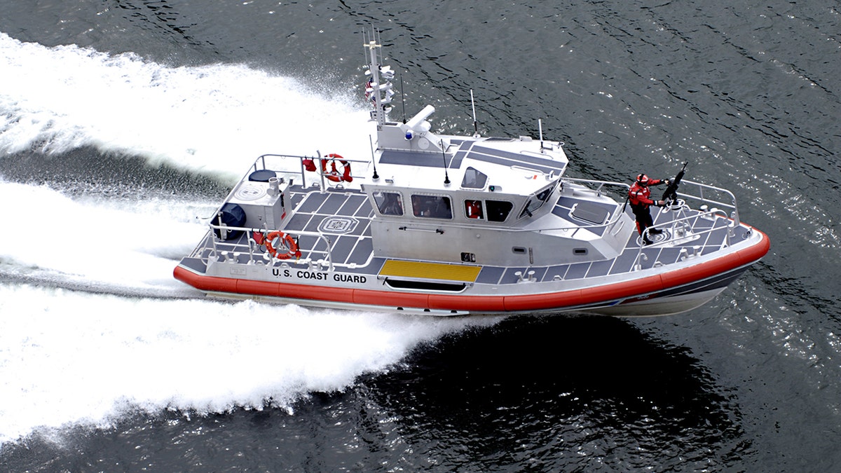 Coast Guard boat underway, seen from air