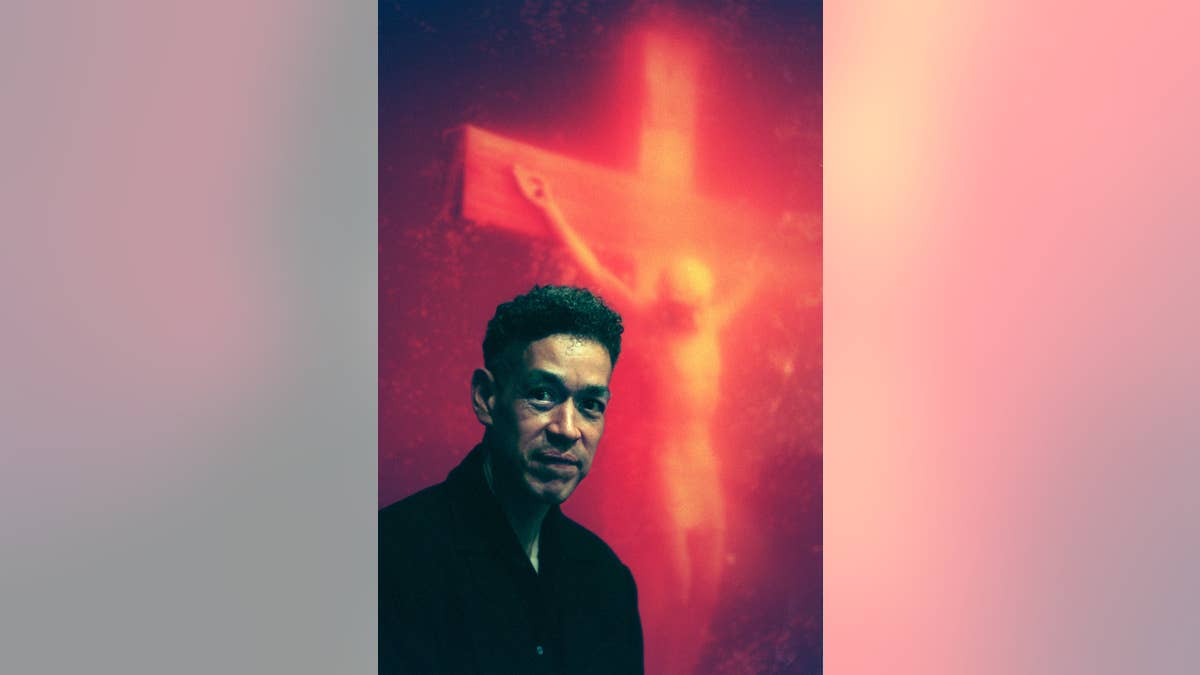 Andres Serrano with "Piss Christ"