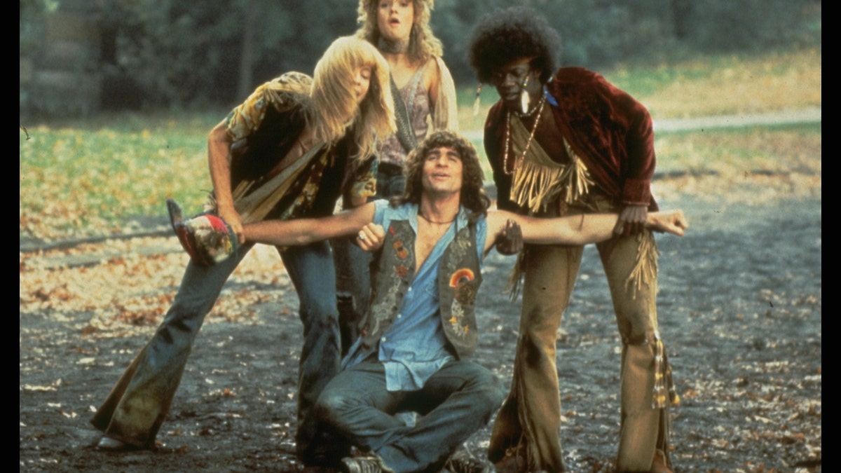 Treat Williams, seated, in a scene from Hair