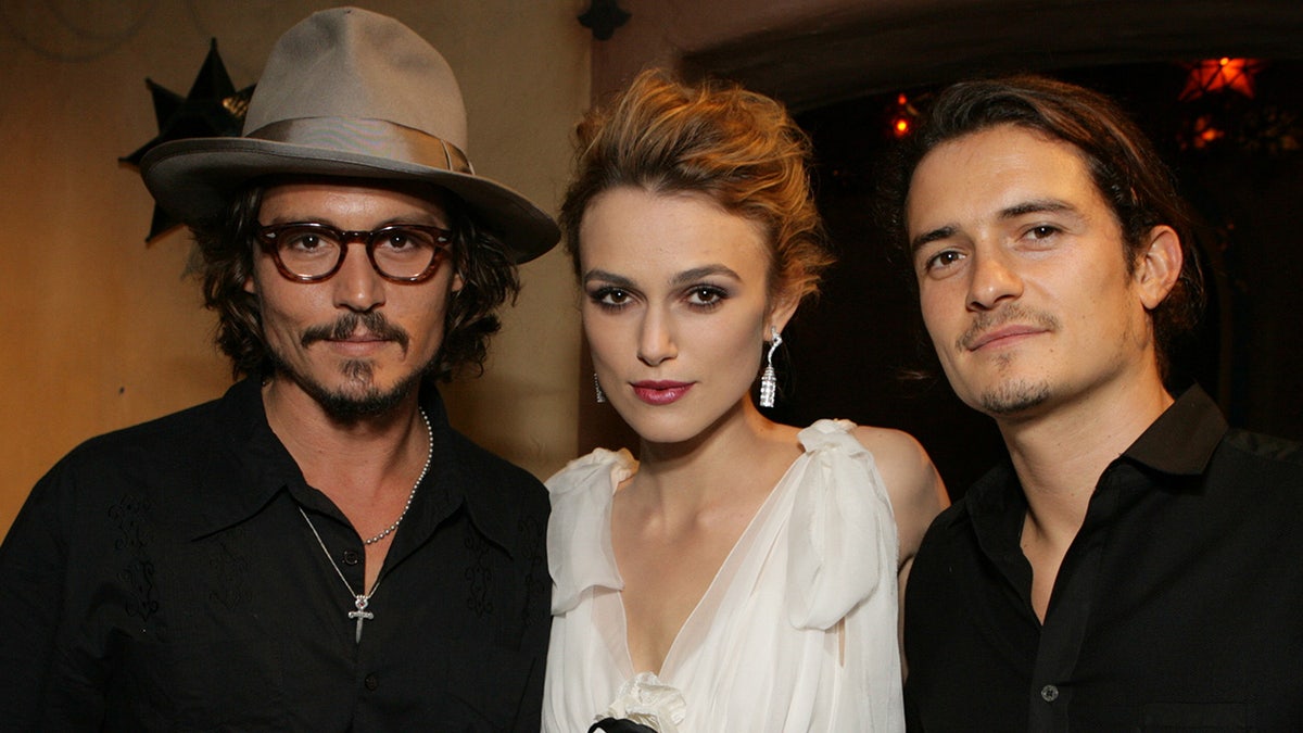 Johnny Depp, Keira Knightley and Orlando Bloom at the premiere of Pirates of the Caribbean 