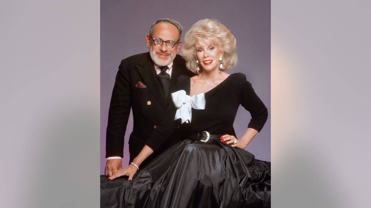 Edgar Rosenberg and Joan Rivers posing together