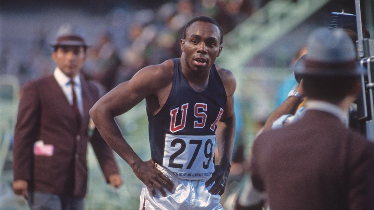 Jim Hines after winning gold at the 1968 Olympics