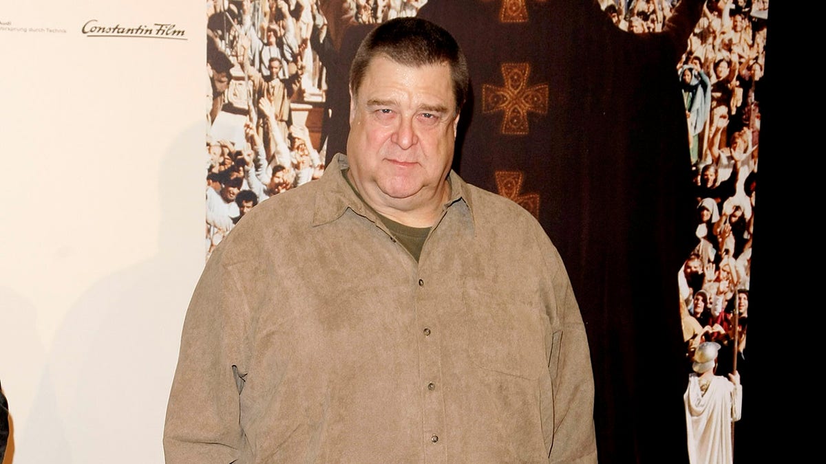 John Goodman attends a movie premiere in 2009.