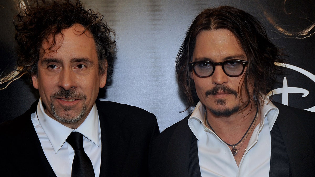 Tim Burton and Johnny Depp at the world premiere of Alice in Wonderland