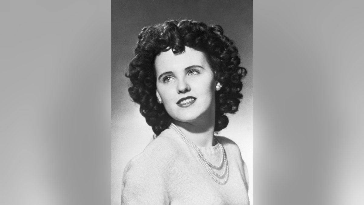 A black and white headshot of Elizabeth Short