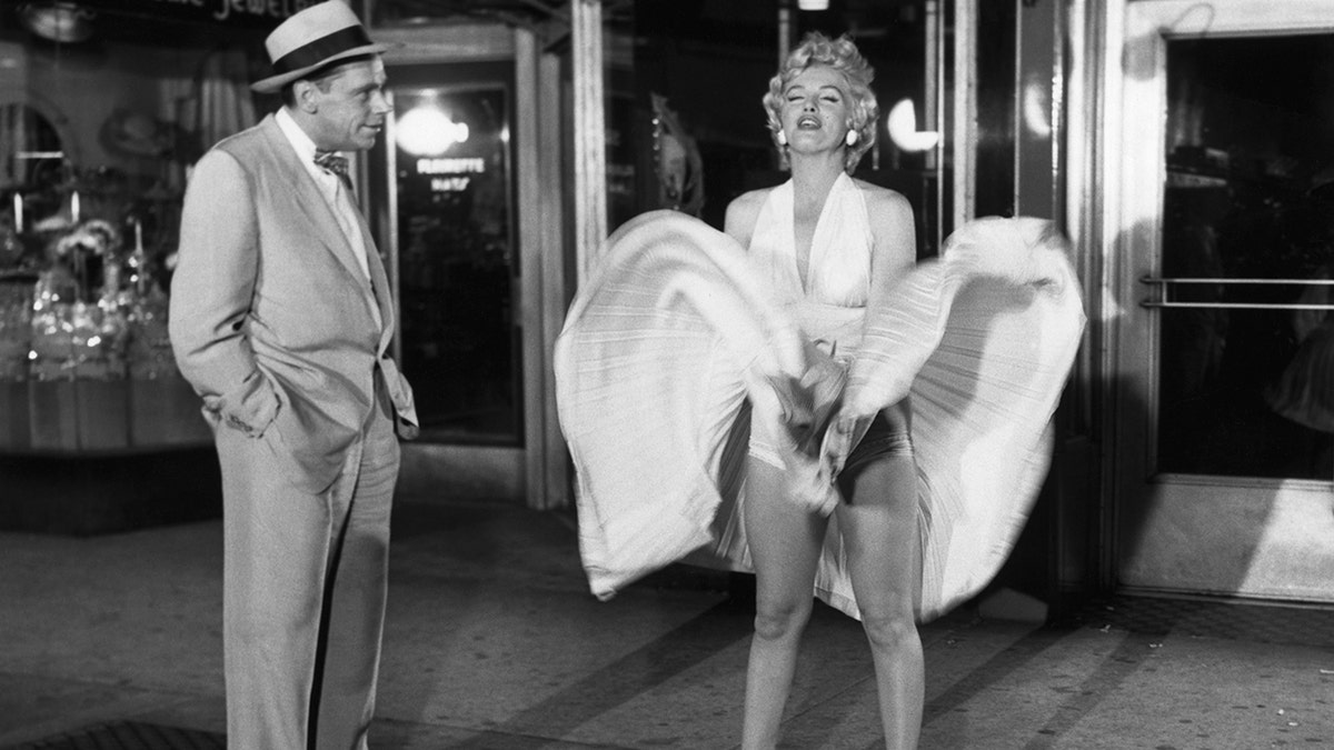 Tom Ewell and Marilyn Monroe in a scene from the movie The Seven Year Itch.
