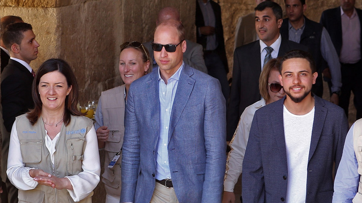 Prince William in a blue blazer and light blue shirt