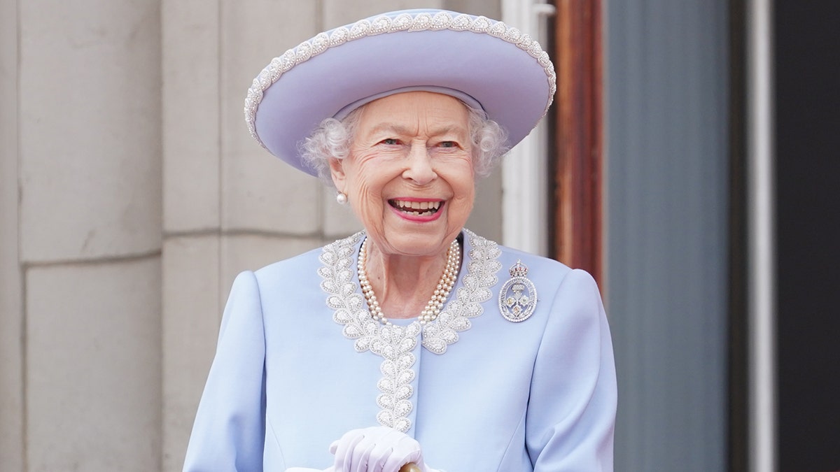 Queen Elizabeth II in a light blue coat dress during Trooping the Colour in 2022
