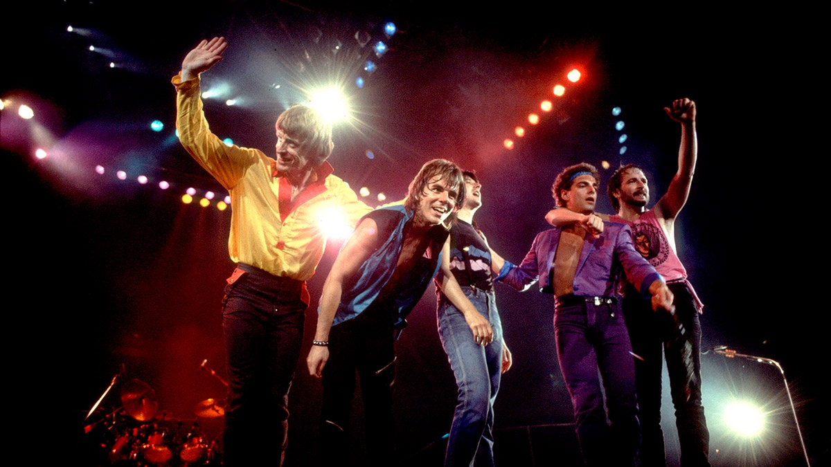 The band Journey performing on stage during the '80s