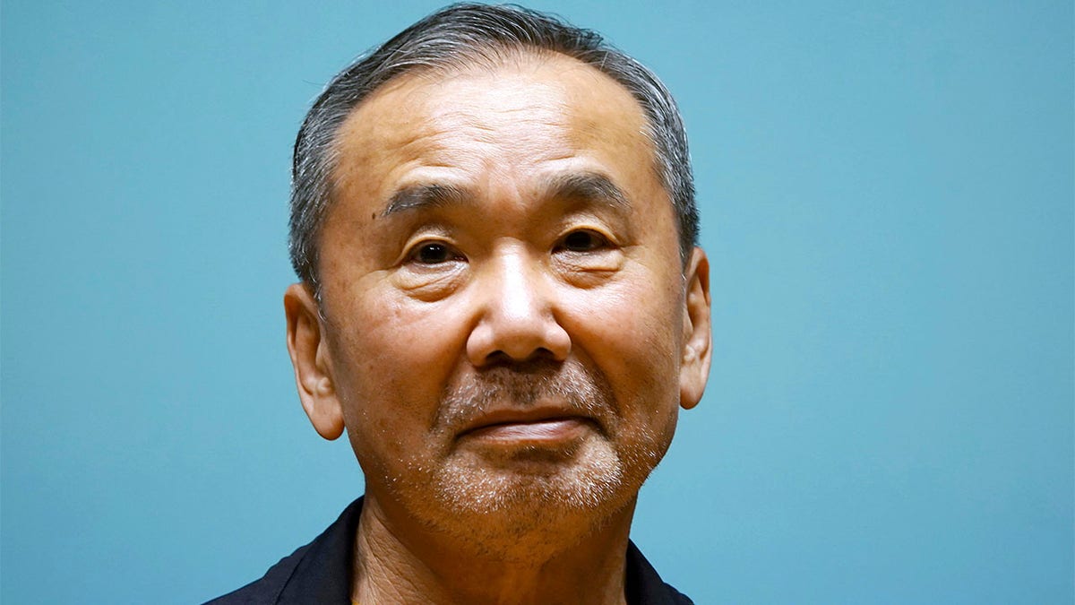 Haruki Murakami poses for picture