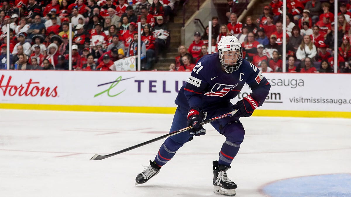 Hilary Knight skates for puck