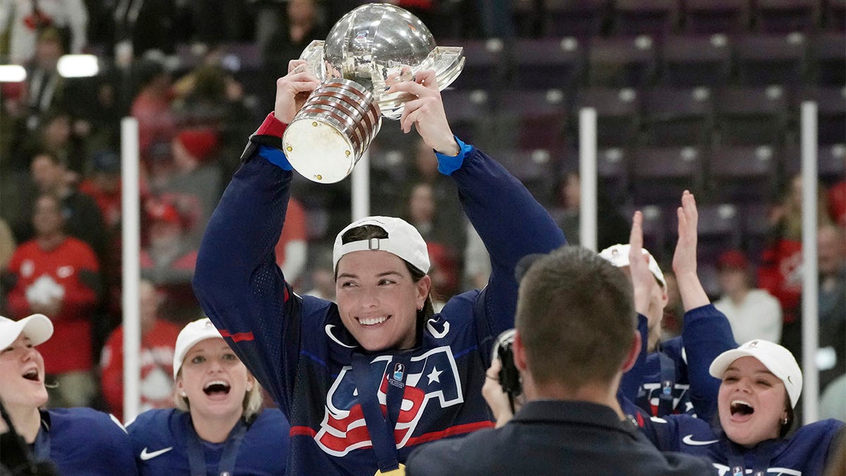 Hilary Knight hoists cup