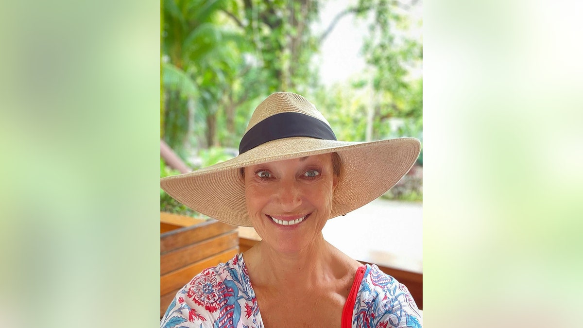 A close-up of Jane Seymour in a selfie wearing a straw hat