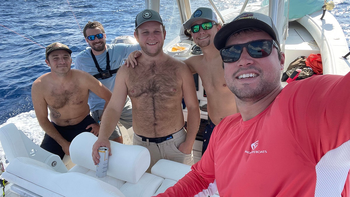 JE and friends on the boat