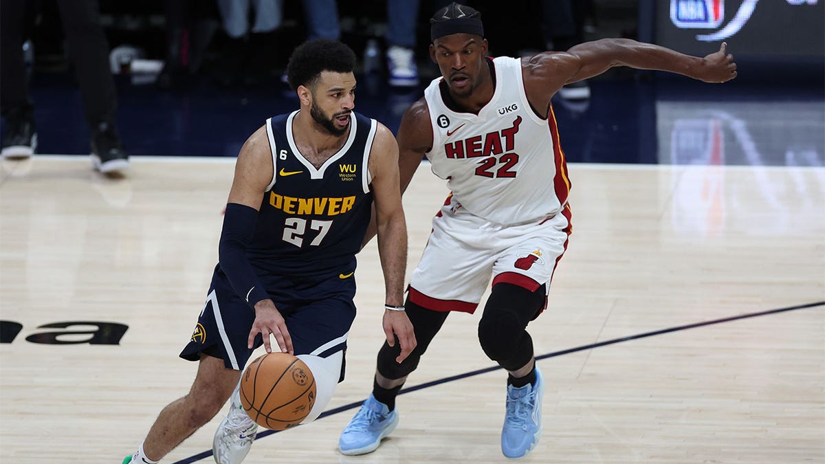 Jamal Murray dribbles the ball