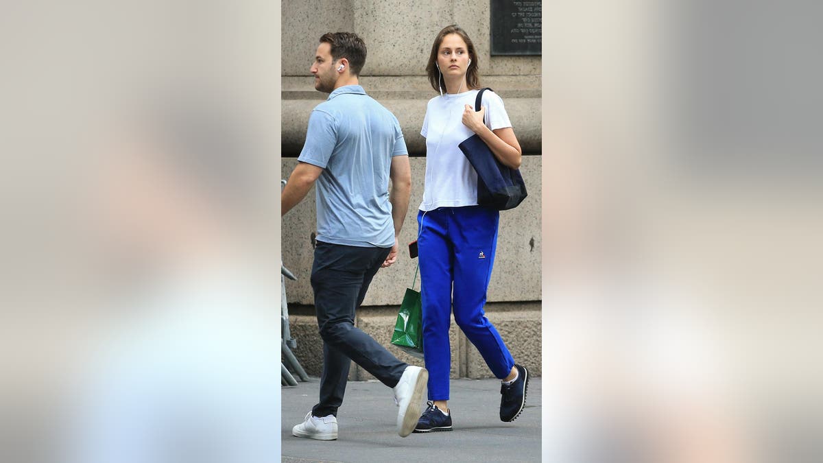 Jeffrey Epstein's last girlfriend Karyna Shuliak walks with shopping bags