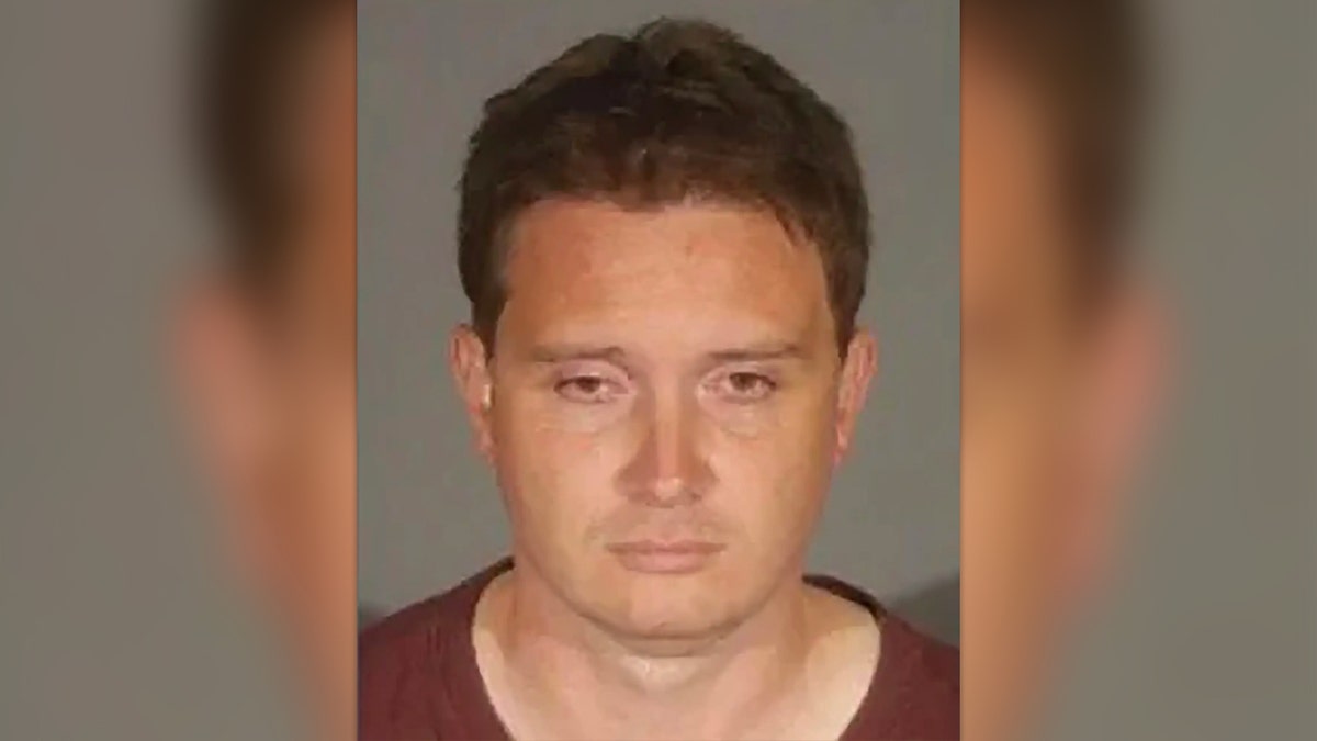 John Alevizos, a Santa Monica DUI suspect, looks down in his mug shot