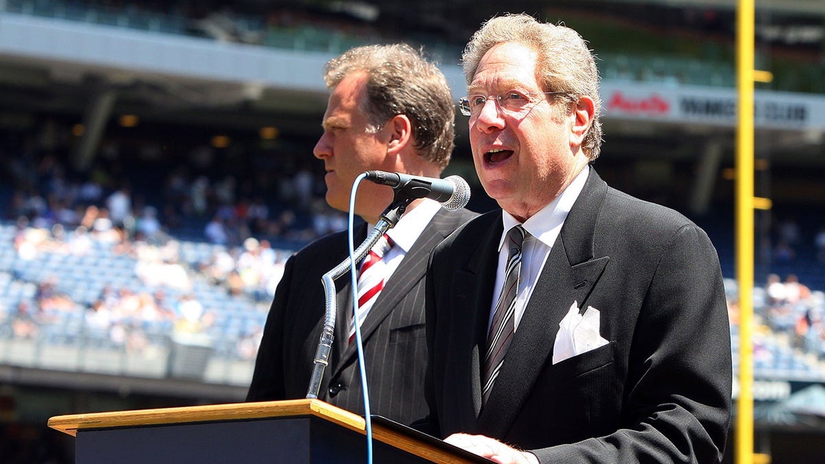 John Sterling at podium