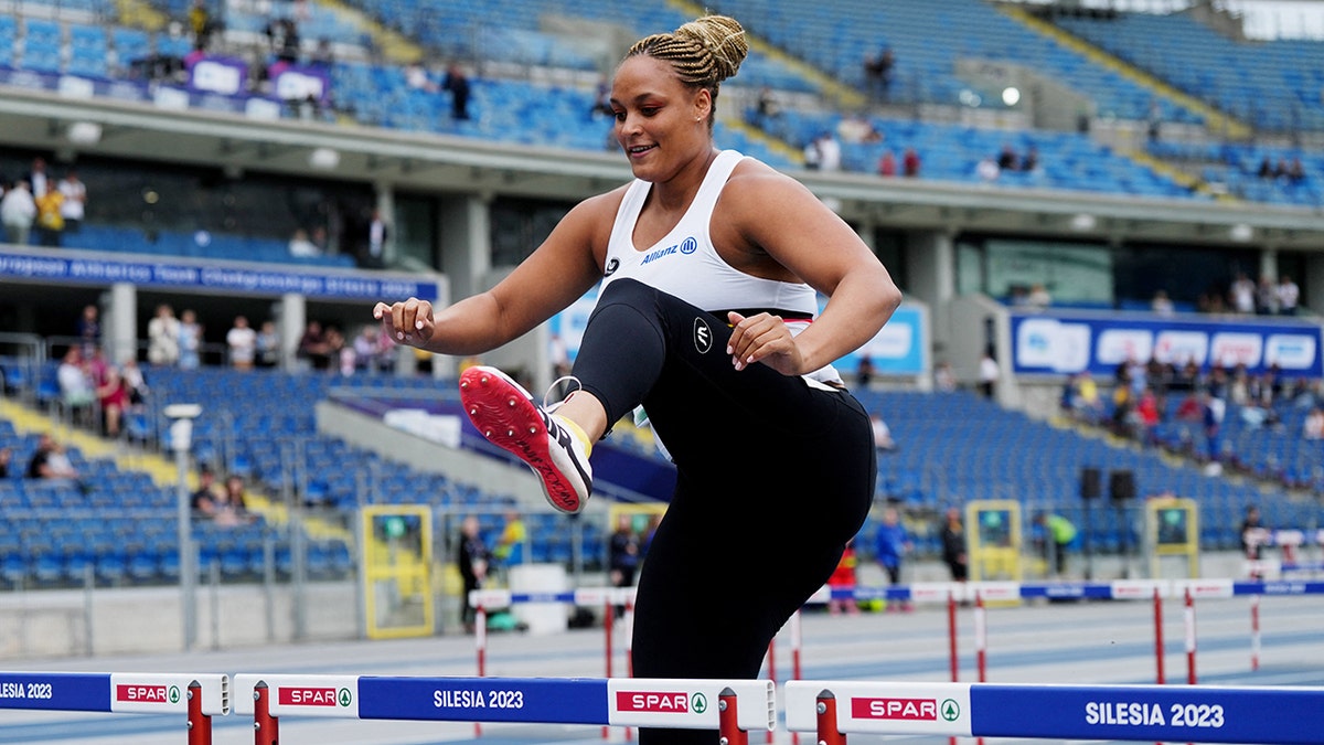 Jolien Boumkwo walks over the hurdle