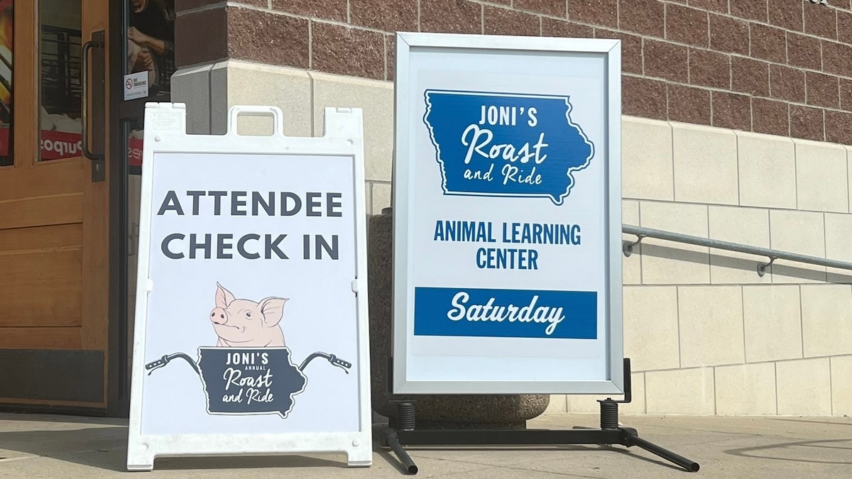 Joni Ernst roast and ride sign