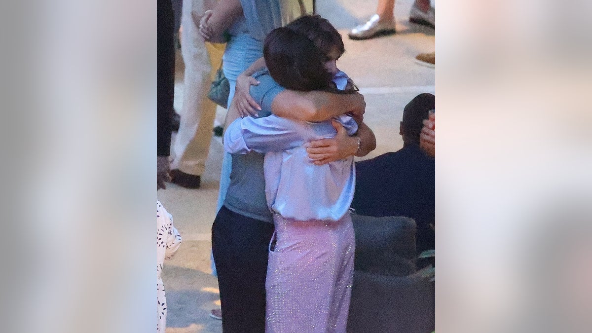 Tom Cruise hugs Hayley Atwell