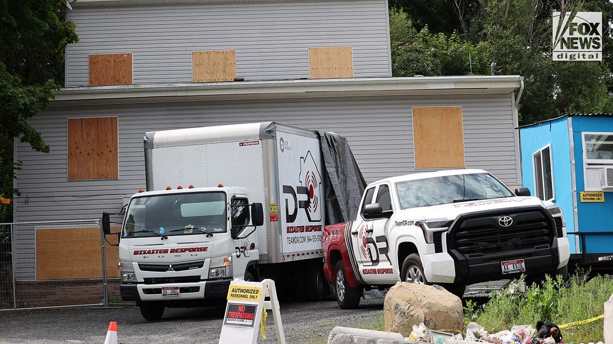 Trucks labeled Disaster Response parked in King Road driveway in Moscow idaho