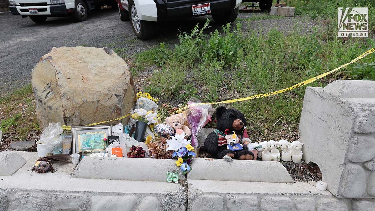 A makeshift memorial outside of 1122 King Road