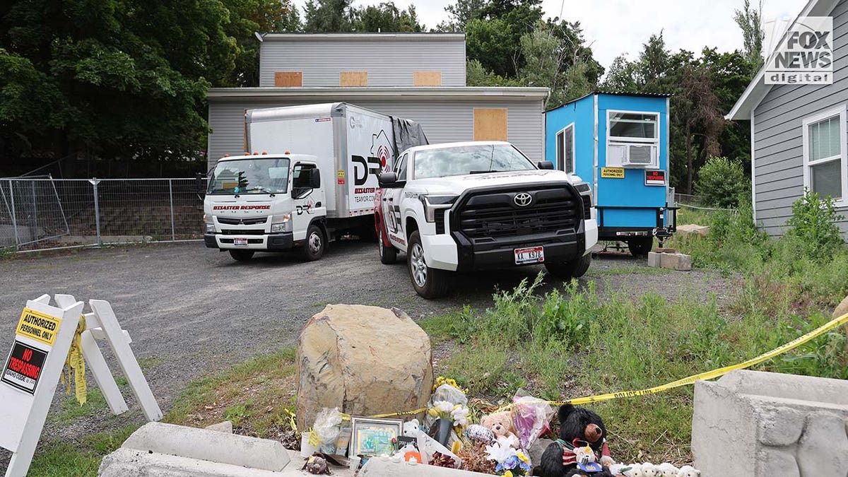 White pickup truck and white van parked outside of the King Road home during daytime 