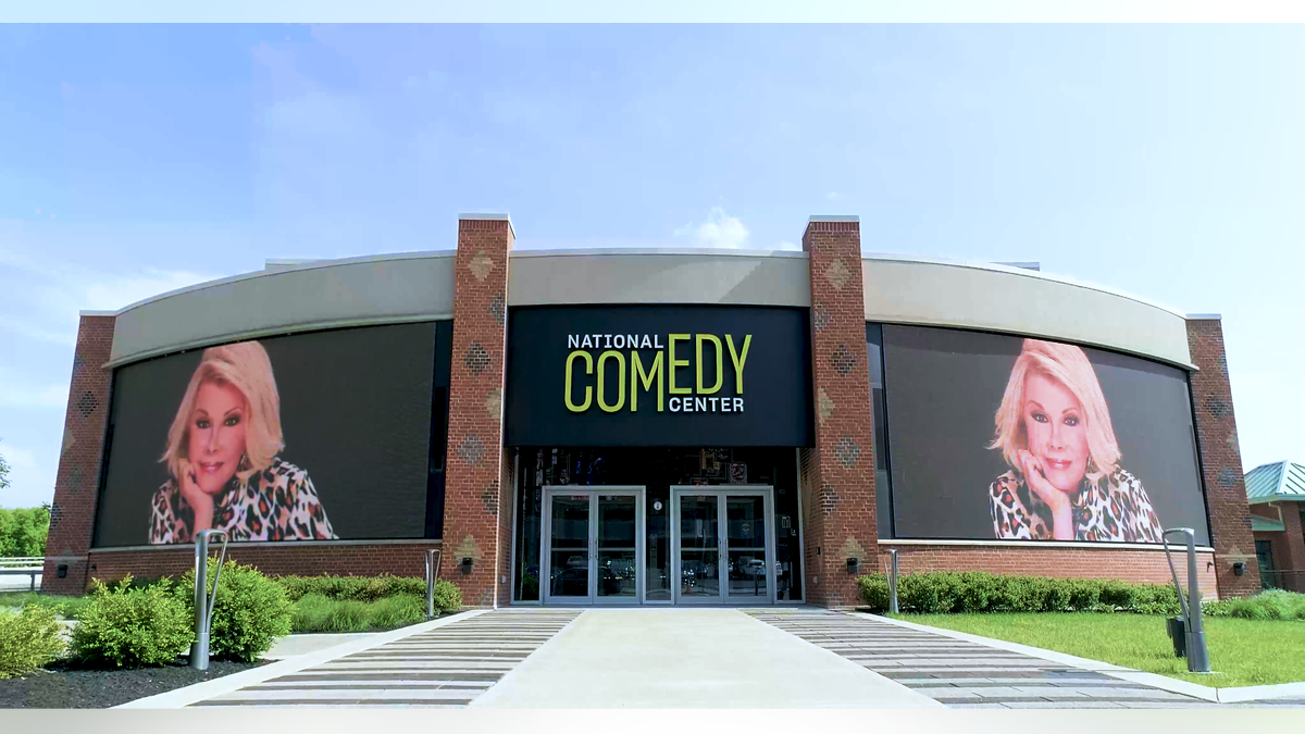 Exterior of the National Comedy Center with Joan Rivers signage.