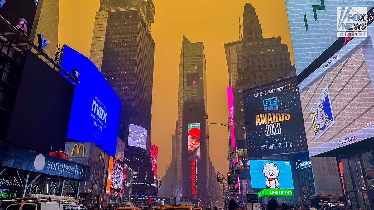 Smoke from Canadian wildfires loom over New York City's Times Square on Wednesday, June 7, 2023.