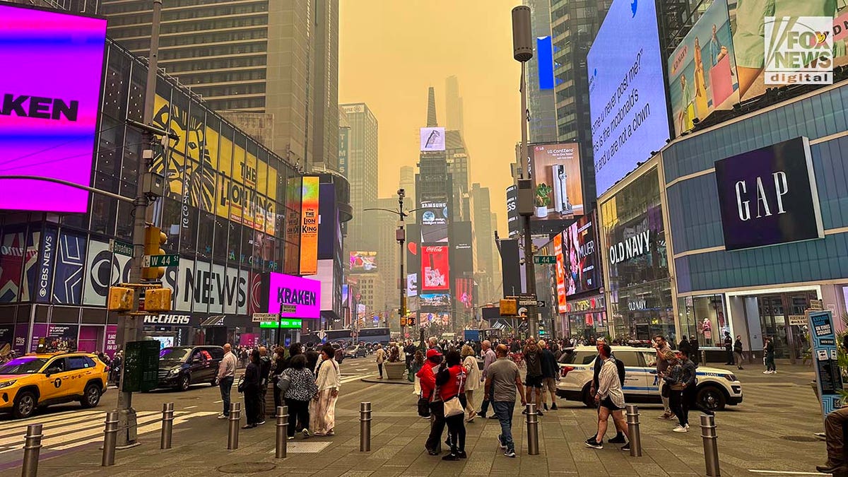 New York Citys Times Square engulfed with smoky haze