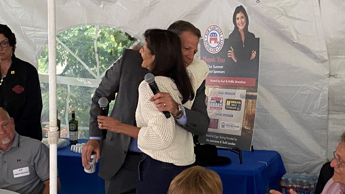 Chris Sununu hugs Nikki Haley in New Hampshire