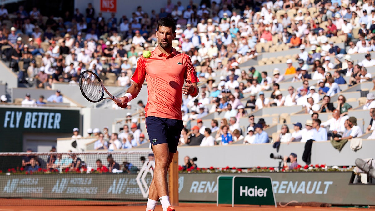 Novak Djokovic of Serbia looks on during a match