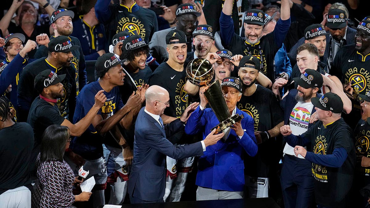 Jamal murray of the denver nuggets holding the nba finals mvp