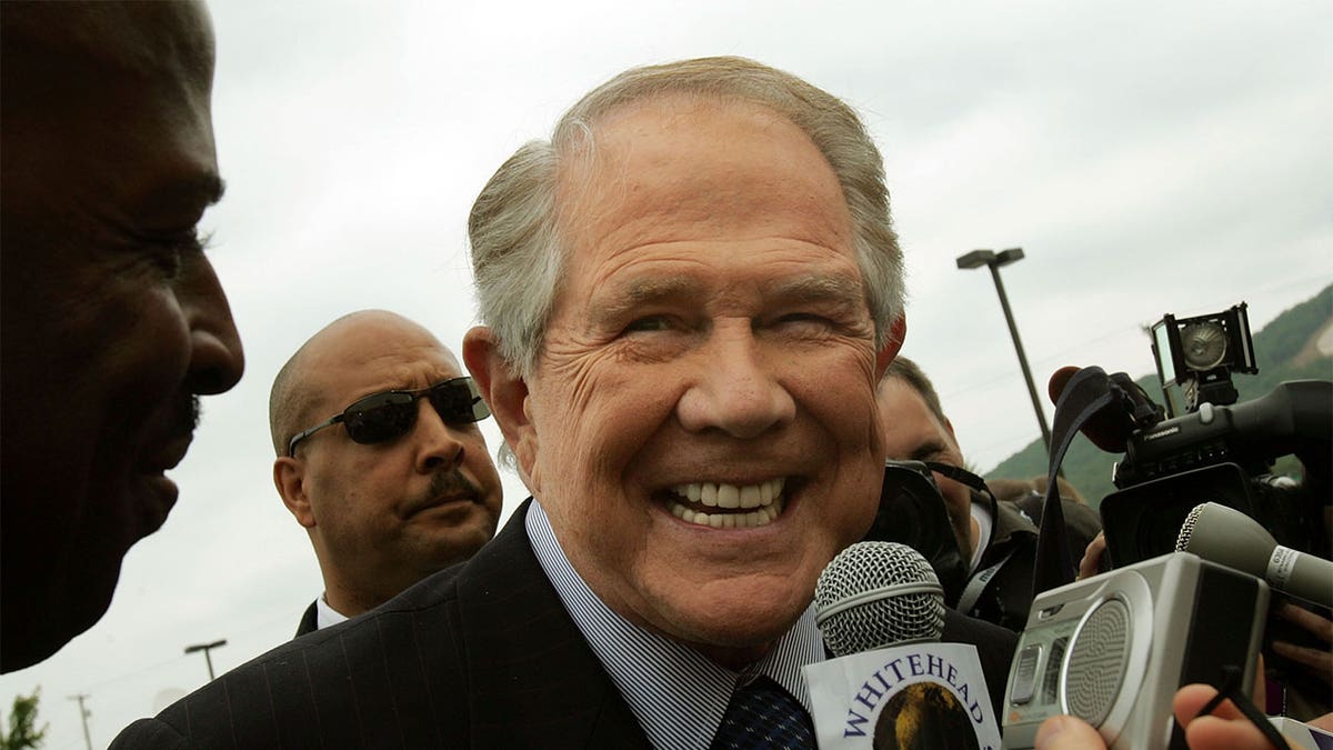 Pat Robertson smiling at the camera.