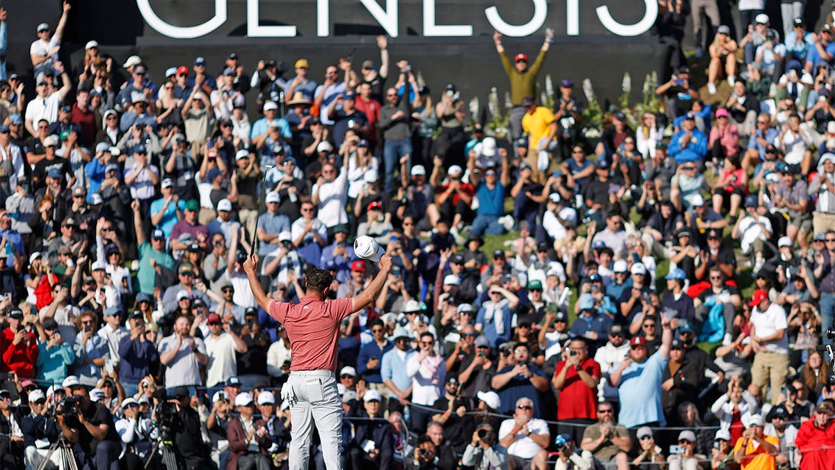 Jon Rahm celebrates at Riviera