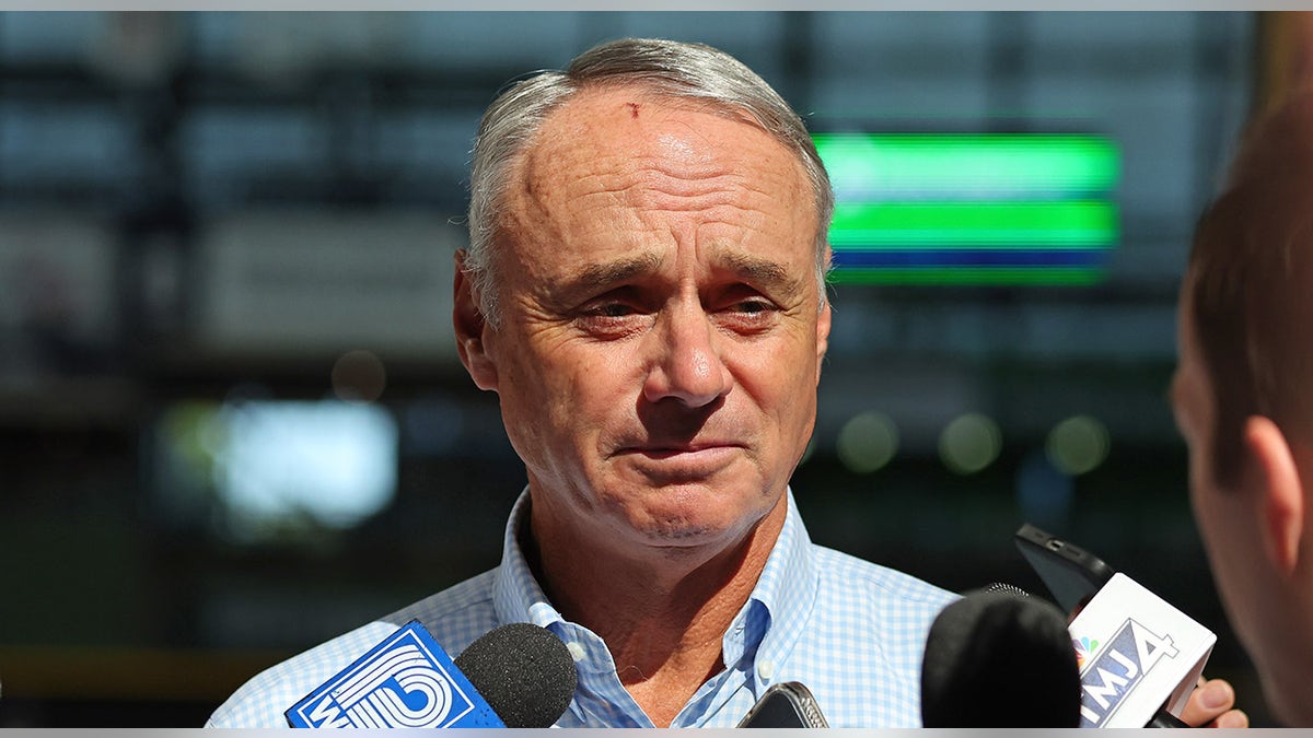 Rob Manfred speaks to the media