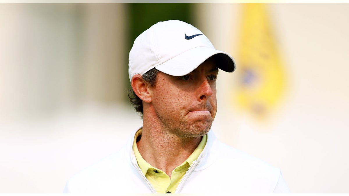 Rory McIlroy purses lips