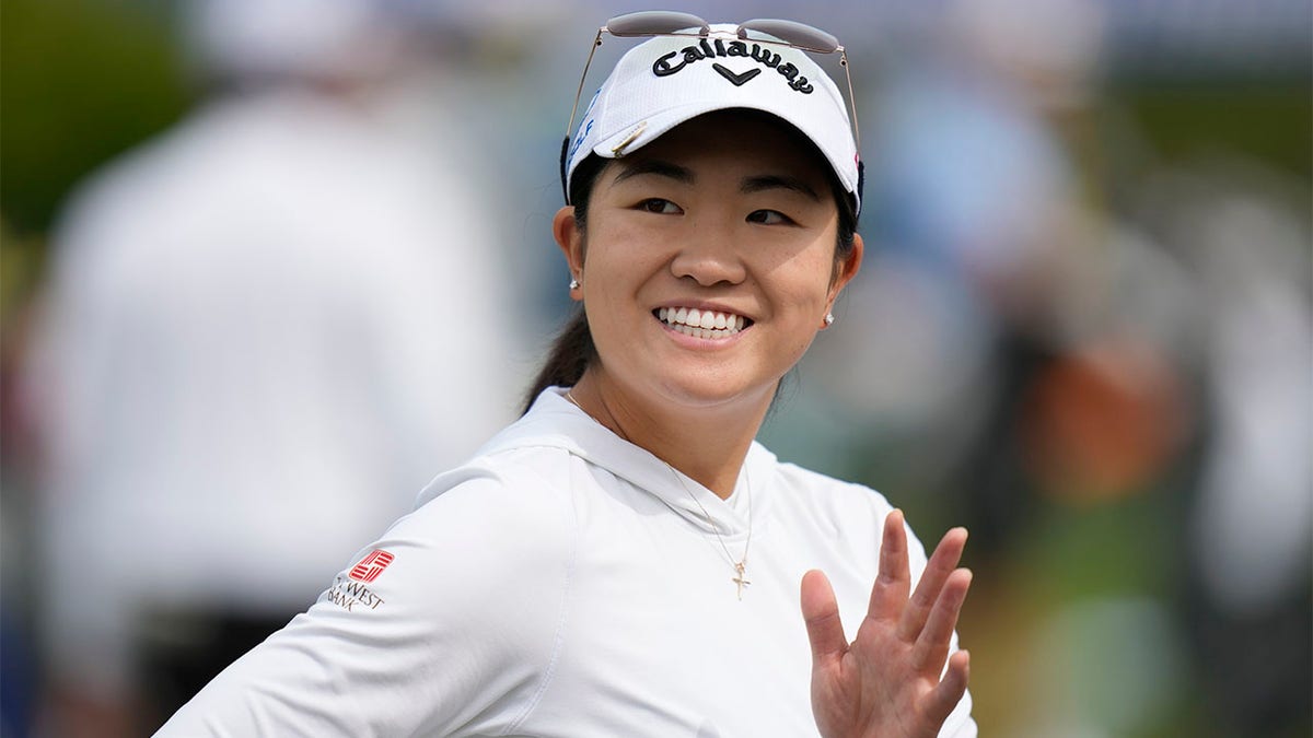 Rose Zhang waves on the driving range