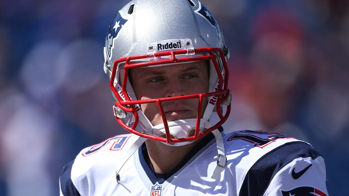 Ryan Mallet with Patriots helmet on