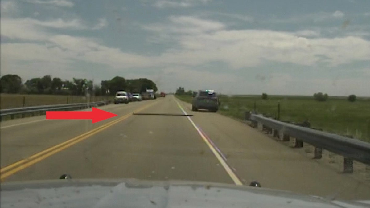 Police deploy Stop Sticks across Highway 50 to stop fleeing suspect