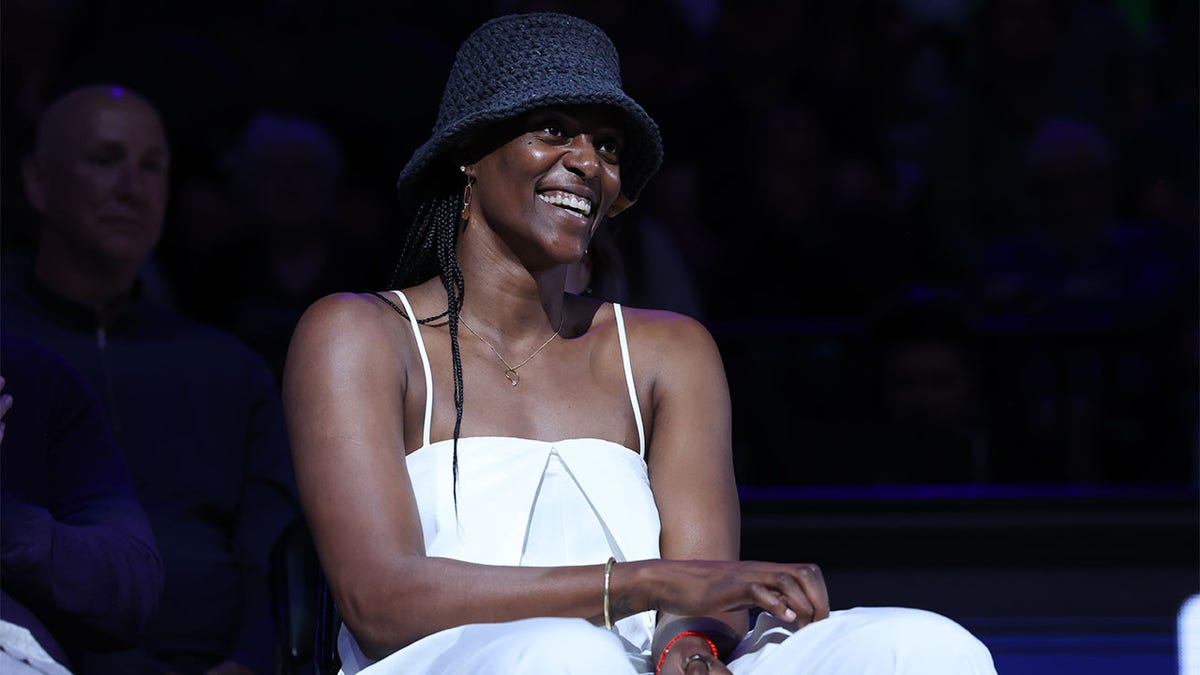 Sylvia Fowles smiles during the jersey retirement ceremony