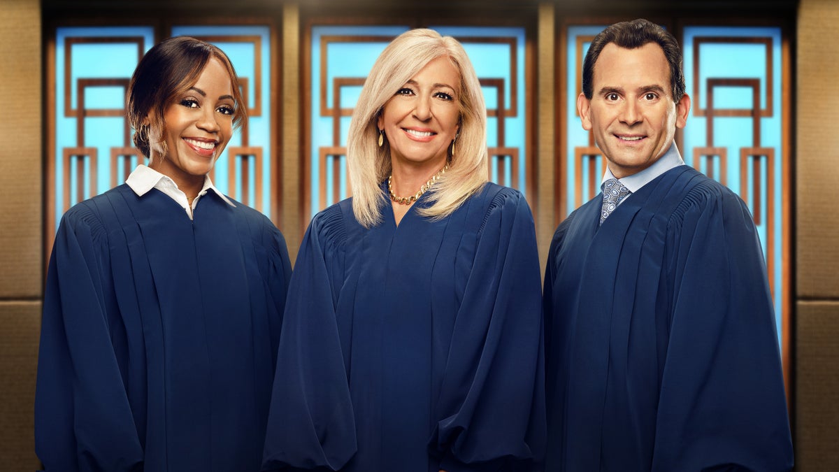 Judge Tanya Acker, Judge Patricia DiMango, Judge Adam Levy pose in blue robes