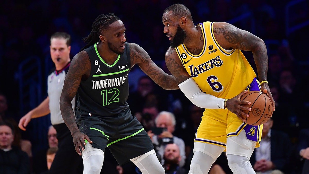 Taurean Prince guards LeBron James