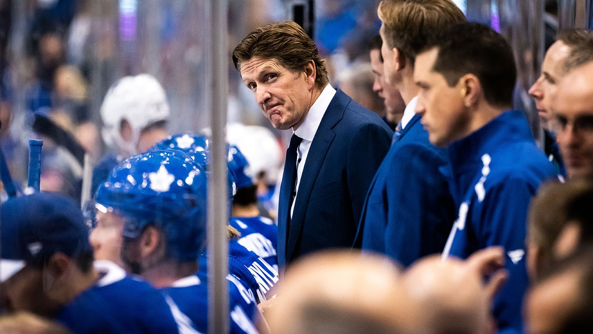 Mike Babcock looks on during a game