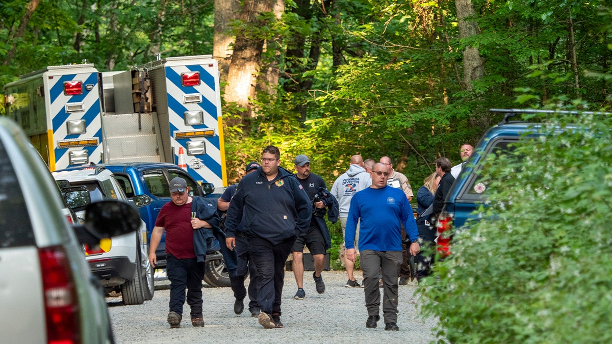 Search and rescue teams walk away from scene