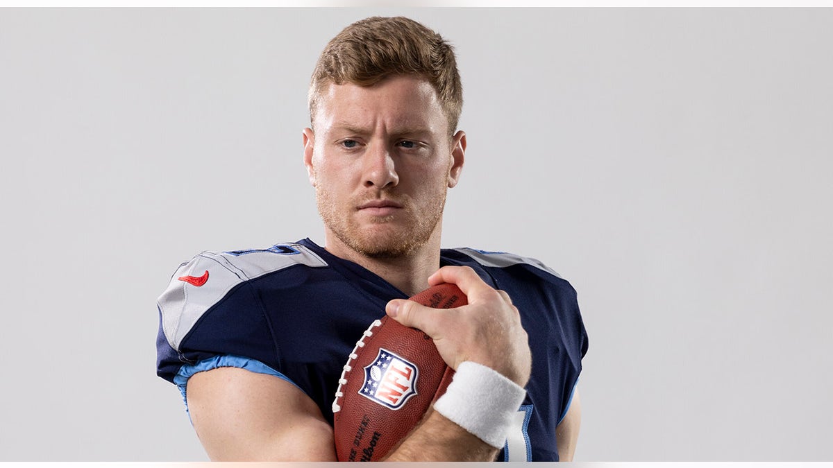 Will Levis poses with football