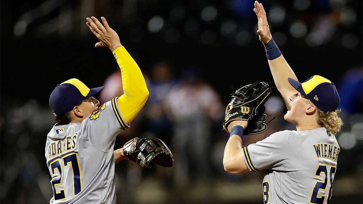 Joey Wiemer and Willy Adames celebrate