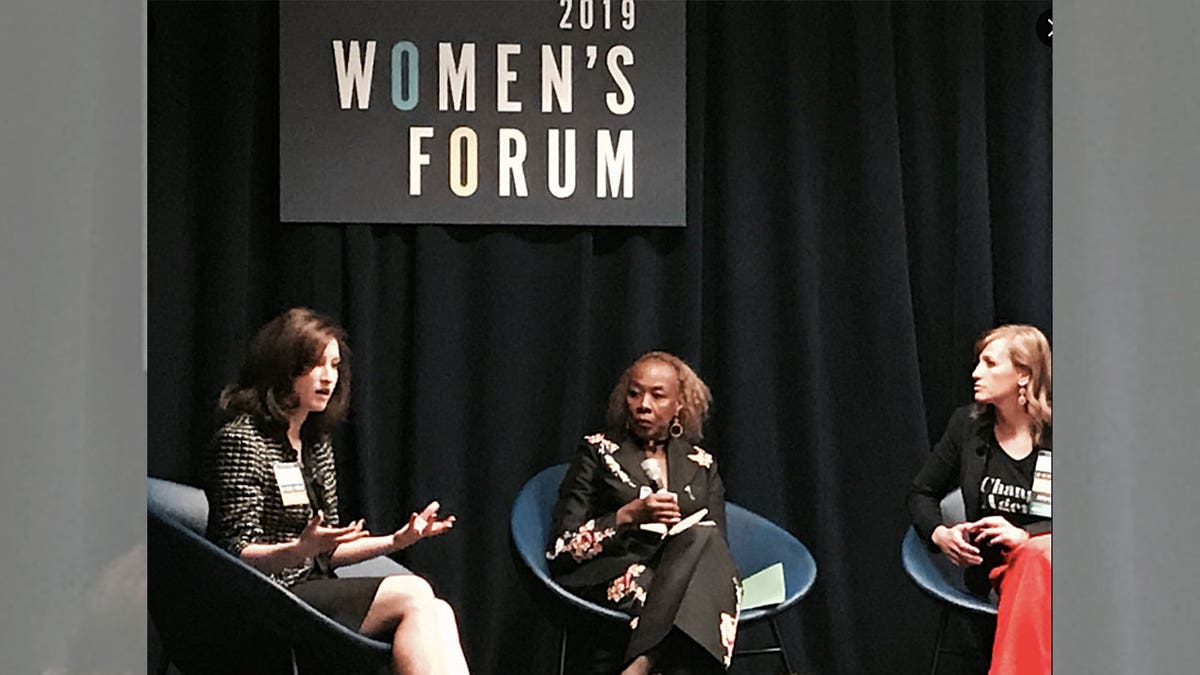 Elizabeth Alexander, left, speaks at Georgetown University's Women's Forum in March 2019 about FTI Consulting and "gender dynamics in the workplace."