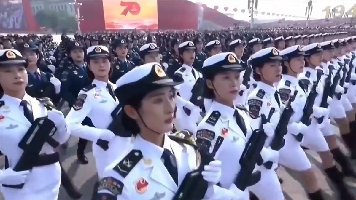'Red Alert': China posts bizarre video of marching female Chinese ...